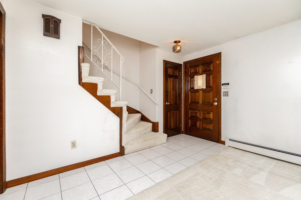 33 Sherwood Road Swampscott, MA 01907 - Photo 3 of 28 a view of an entryway with staircase
