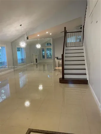 a front view of a house with wooden floor