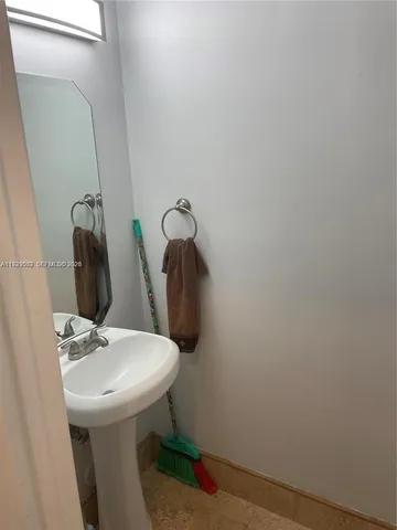 a view of a swimming pool with a sitting area