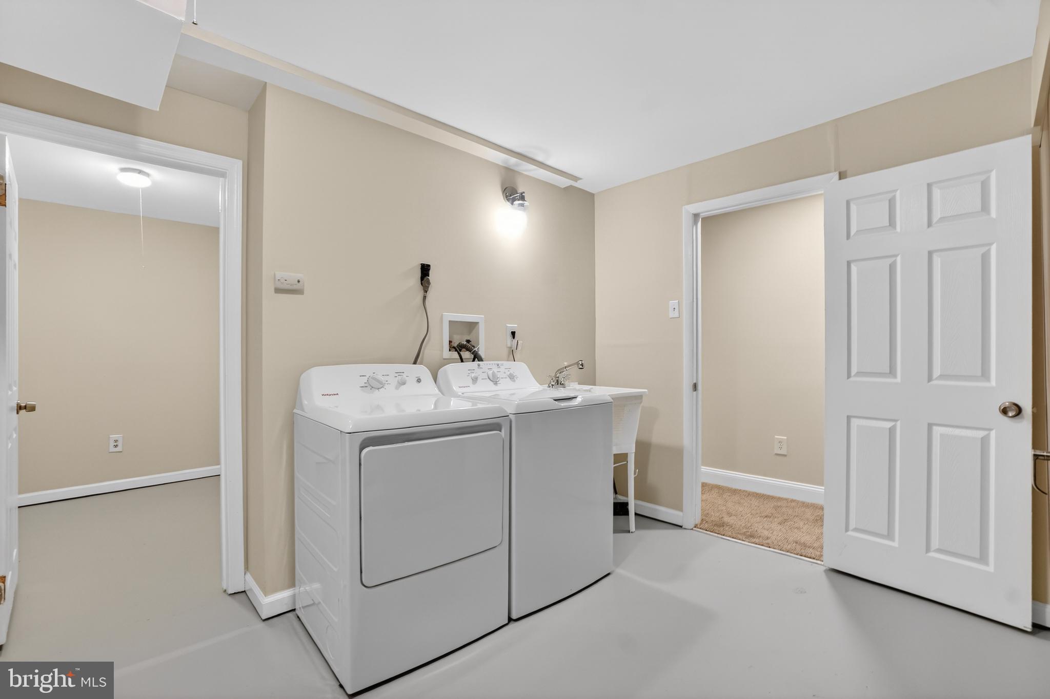 1232 Palmer Road, Unit 111 Fort Washington, MD 20744 - Photo 31 of 45 a utility room with dryer and washer