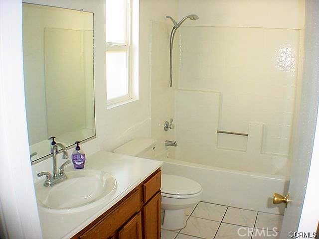 16332 Trelaney Road Fontana, CA 92337 - Photo 7 of 8 a bathroom with a sink a toilet and shower