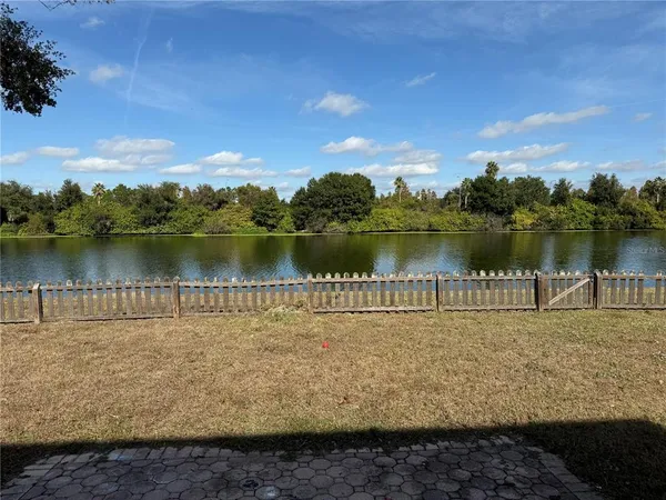 a view of a lake with a city