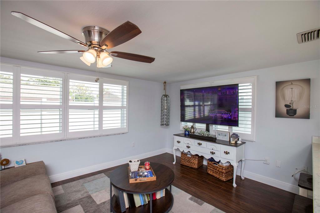 5240 School Road New Port Richey, FL 34653 - Photo 14 of 32 a living room with furniture and a window