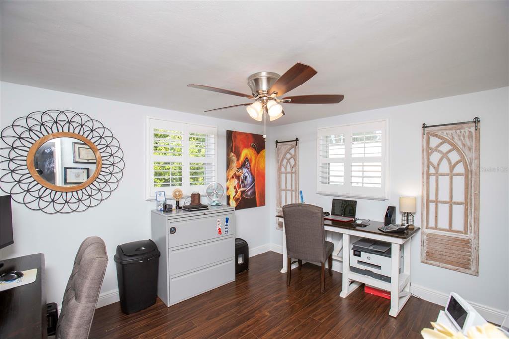 5240 School Road New Port Richey, FL 34653 - Photo 21 of 32 a living room with furniture and a window