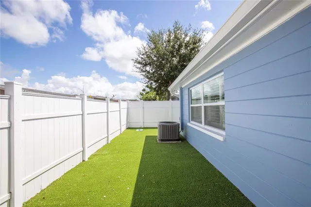 a view of a backyard with garden