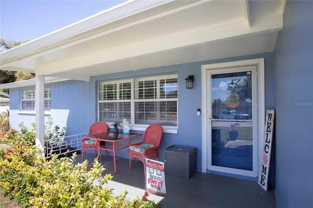 a room with furniture toys and a window