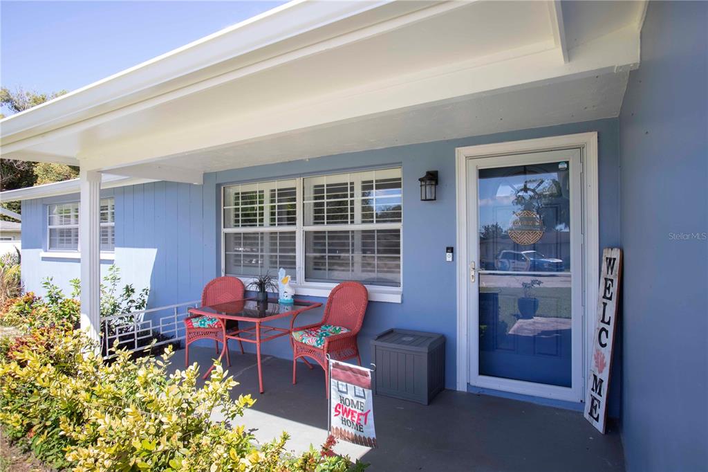 5240 School Road New Port Richey, FL 34653 - Photo 3 of 32 a room with furniture toys and a window