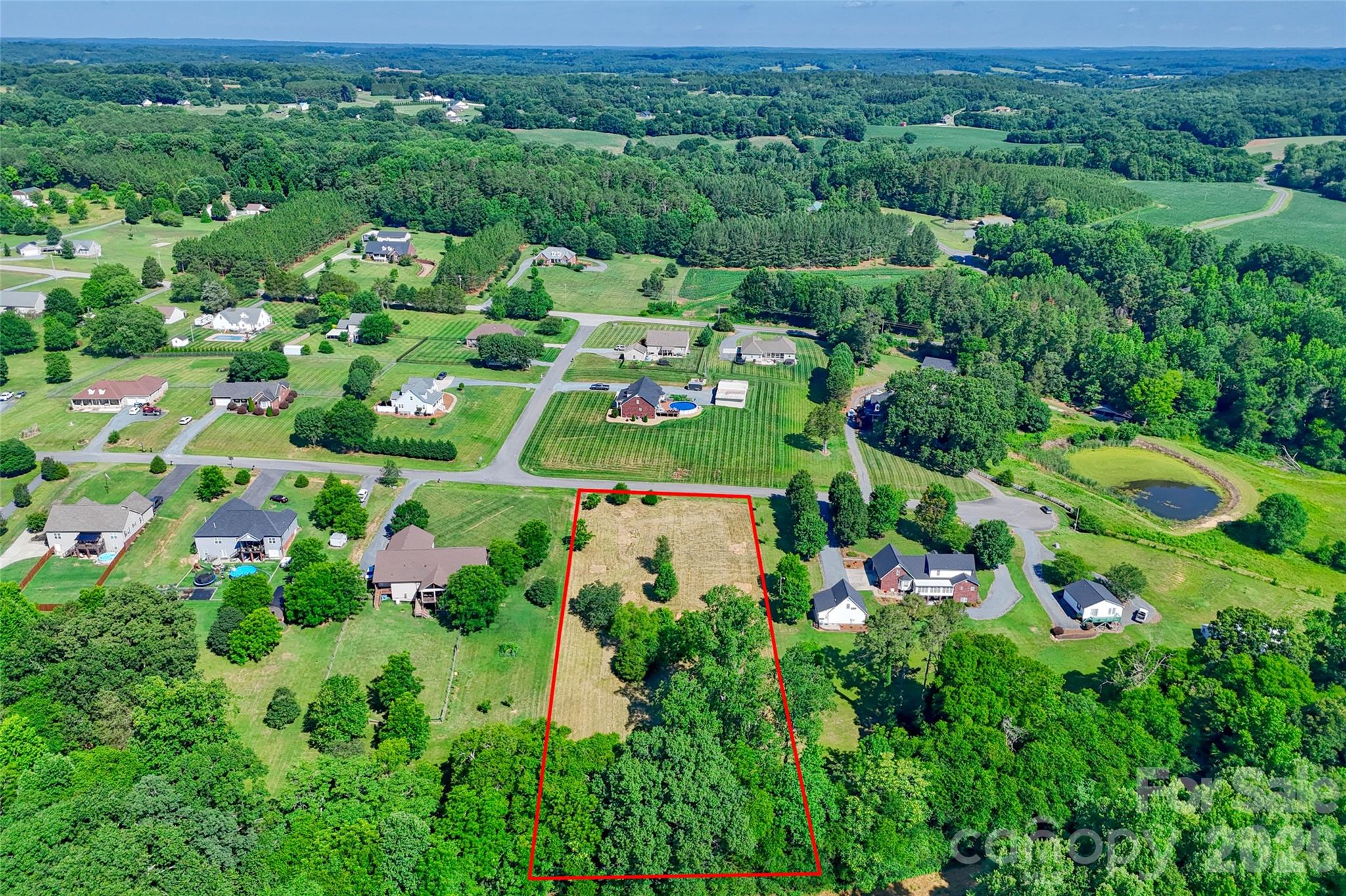 Lot 3 Crepts Branch Road, Unit 3 Locust, NC 28097 - Photo 29 of 36 a view of a large body of water with lots of green space
