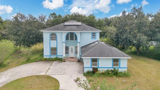 a view of balcony and yard