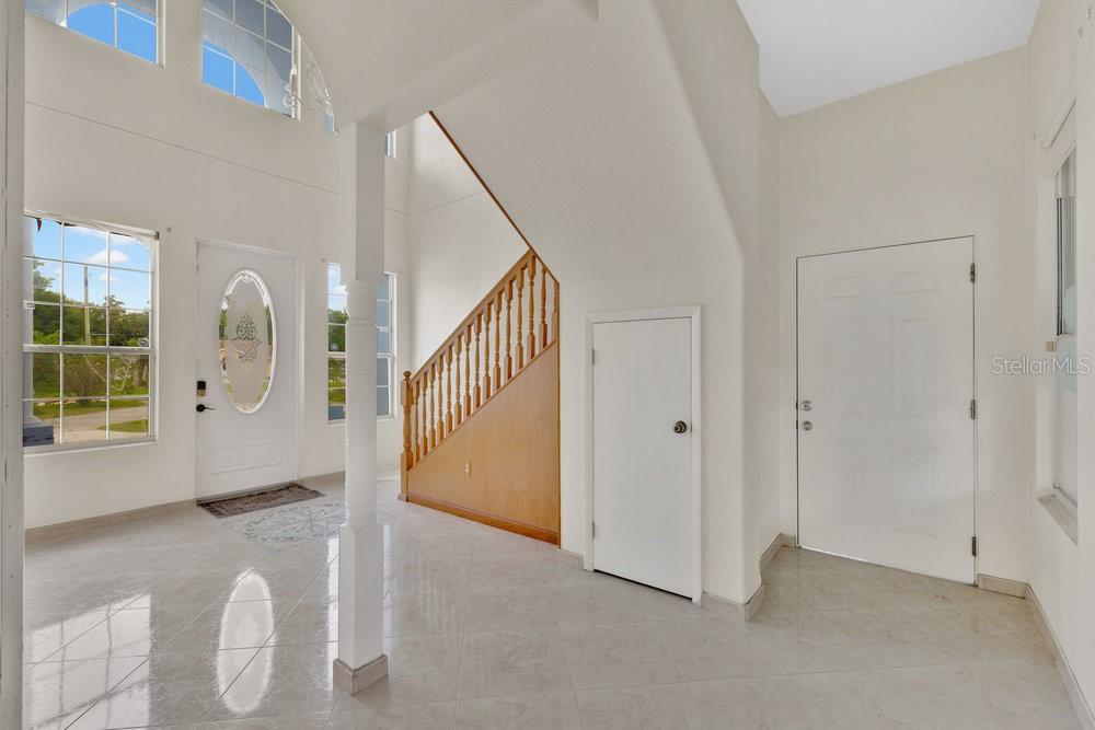 4110 Santa Barbara Road Kissimmee, FL 34746 - Photo 24 of 32 a view of a livingroom with furniture and entryway