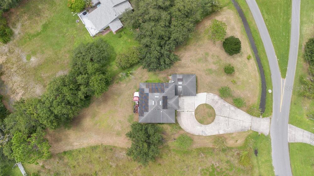 4110 Santa Barbara Road Kissimmee, FL 34746 - Photo 26 of 32 a bathroom with a granite countertop sink and garden