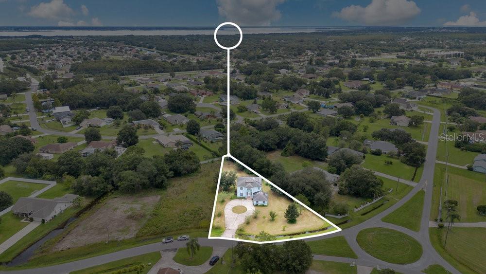 4110 Santa Barbara Road Kissimmee, FL 34746 - Photo 6 of 32 a view of roof with wooden floor