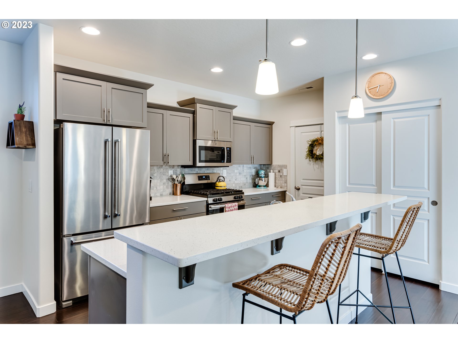 660 Fox Pine Lane Eugene, OR 97405 - Photo 12 of 48 a kitchen with a refrigerator a stove and a sink