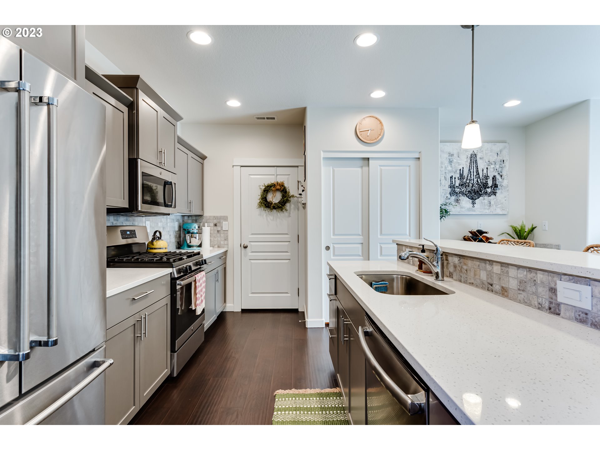 660 Fox Pine Lane Eugene, OR 97405 - Photo 13 of 48 a kitchen with cabinets and stainless steel appliances
