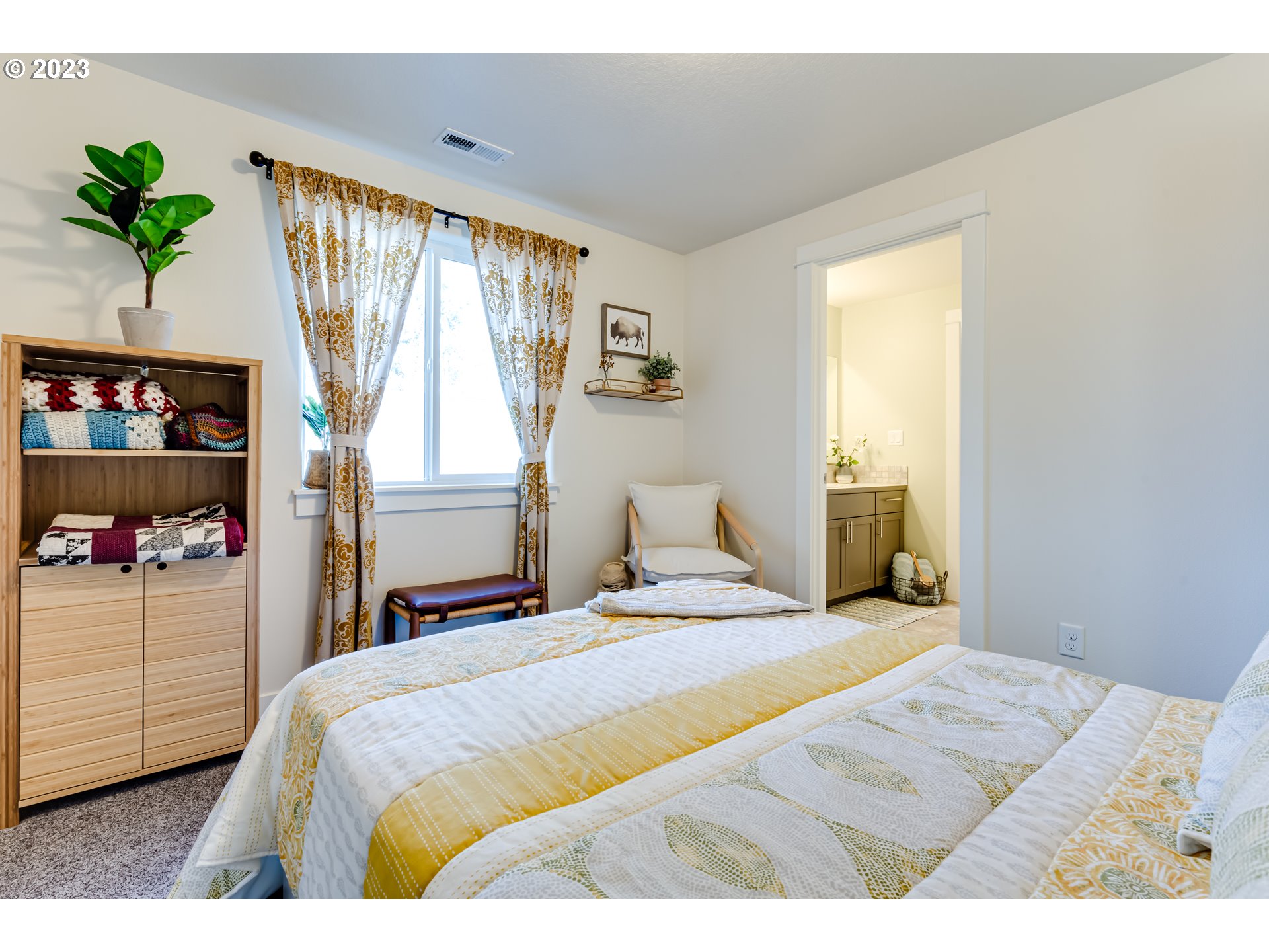 660 Fox Pine Lane Eugene, OR 97405 - Photo 30 of 48 a bedroom with a bed and a window