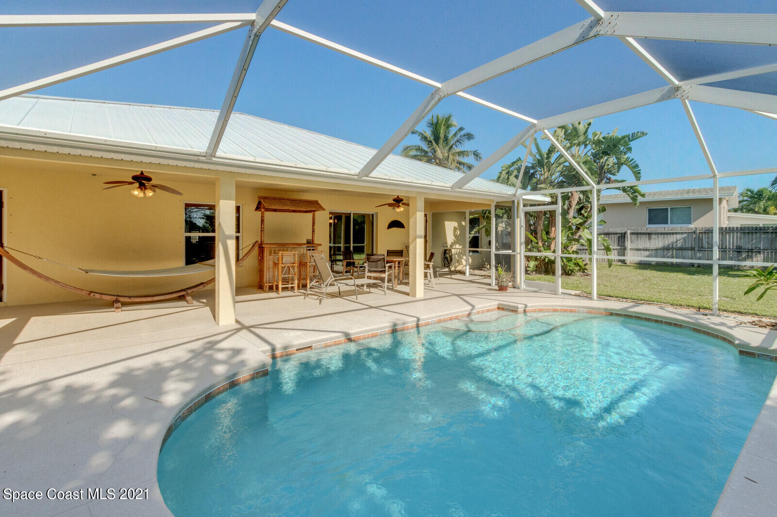 2524 Carmel Road Indialantic, FL 32903 - Photo 25 of 30 a view of a house with a swimming pool