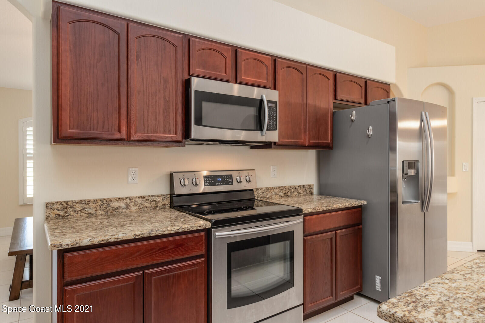 2524 Carmel Road Indialantic, FL 32903 - Photo 8 of 30 a stove top oven sitting inside of a kitchen