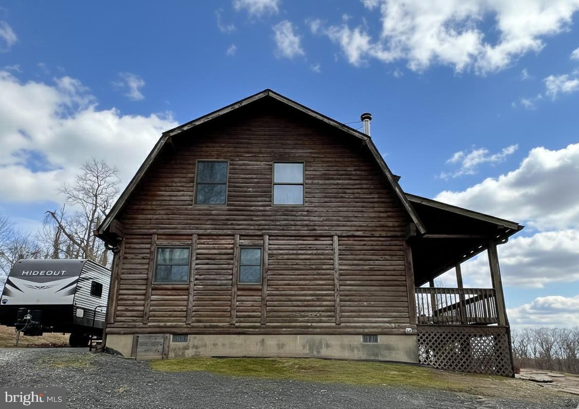10680 Allens Fresh Road Charlotte Hall, MD 20622 - Photo 6 of 22 a front view of a house with a yard