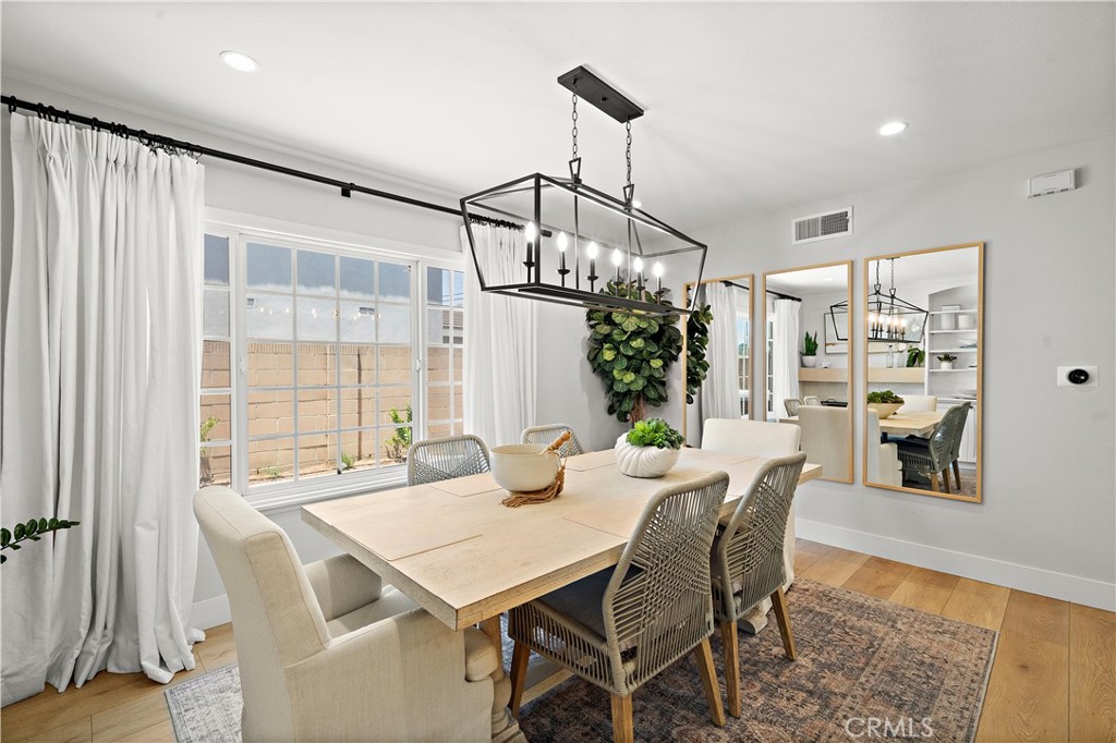 8741 La Roca Avenue Fountain Valley, CA 92708 - Photo 10 of 50 Dining room with 2nd fireplace