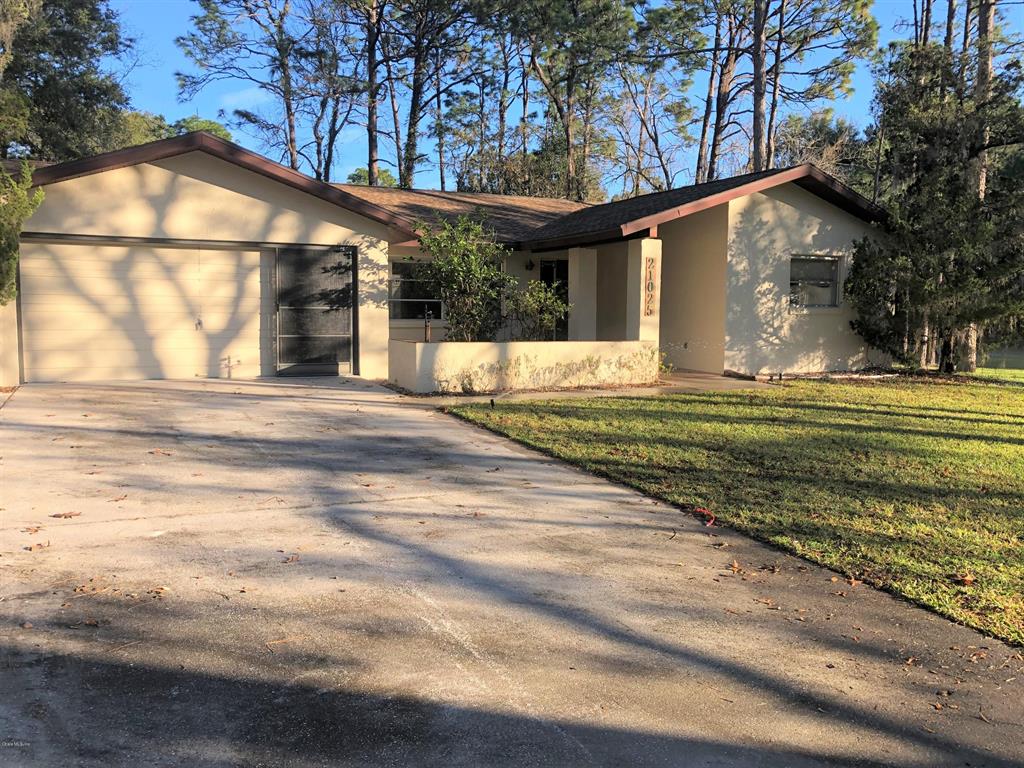 21025 Southwest 93rd Lane Road Dunnellon, FL 34431 - Photo 1 of 1 Lovely 2/3/2 Woodlands Home