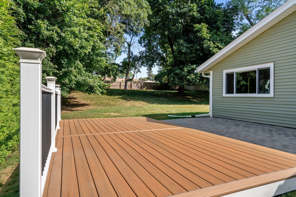 51 Griffin Road Framingham, MA 01701 - Photo 25 of 29 a view of outdoor space and deck with large trees