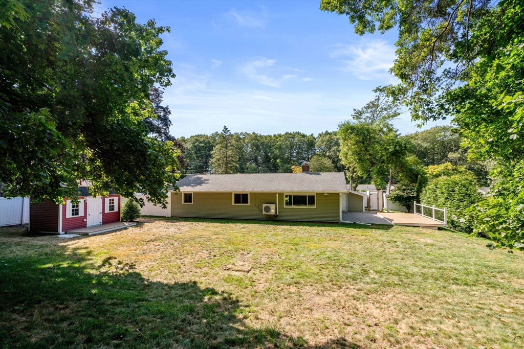51 Griffin Road Framingham, MA 01701 - Photo 29 of 29 a swimming pool is sitting in the grass next to a yard