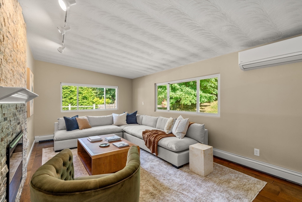 51 Griffin Road Framingham, MA 01701 - Photo 6 of 29 a living room with furniture and a large window