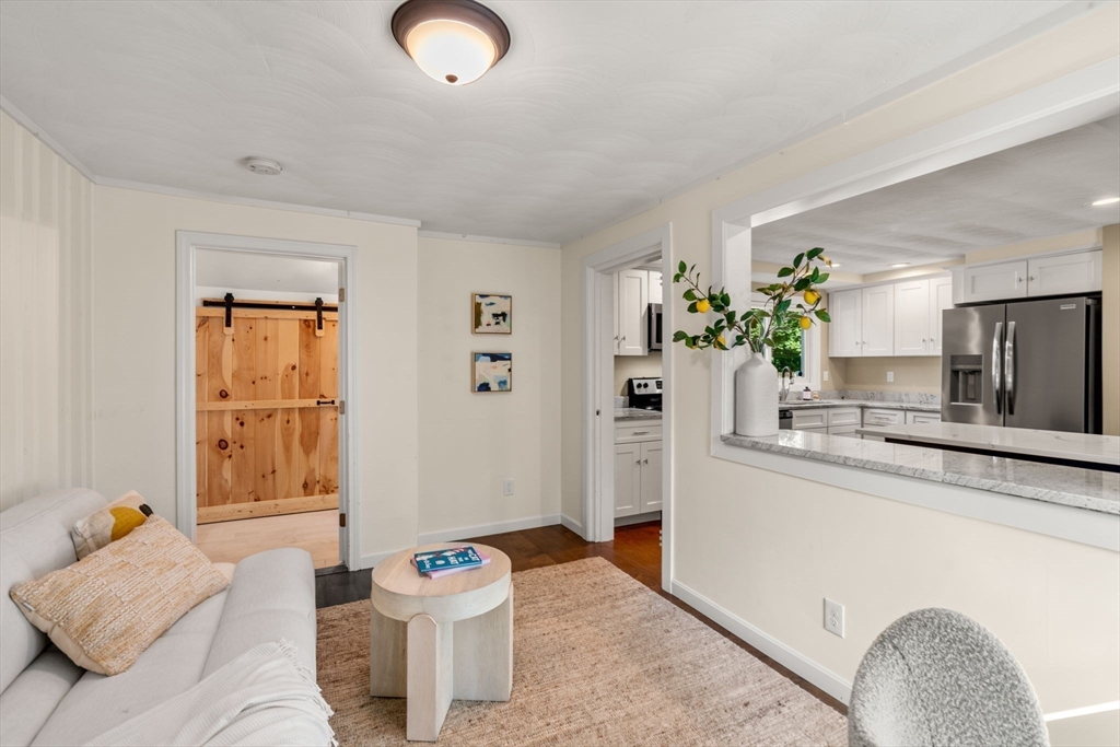 51 Griffin Road Framingham, MA 01701 - Photo 10 of 29 a living room with furniture and wooden floor