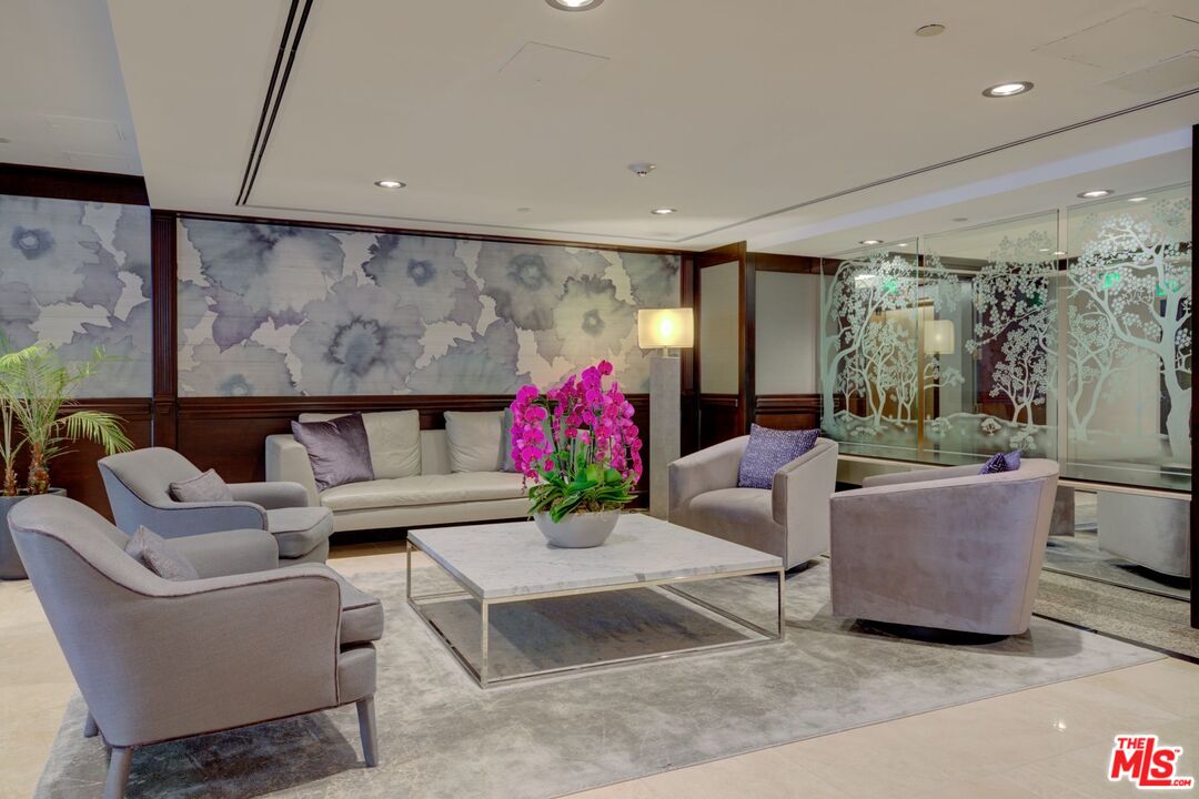 200 North Swall Drive, Unit PH6 Beverly Hills, CA 90211 - Photo 16 of 22 a living room with furniture and a potted plant