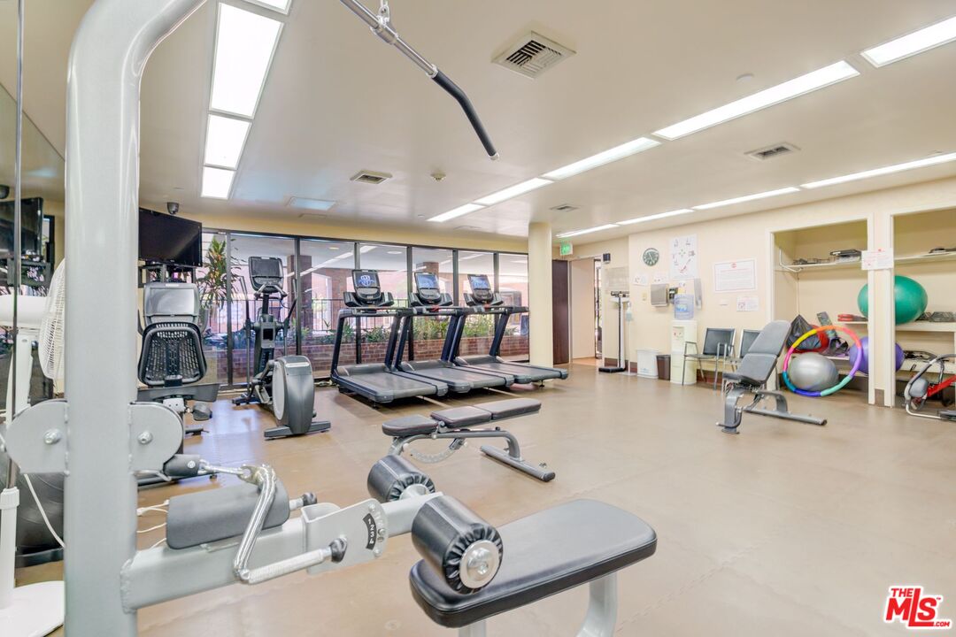 200 North Swall Drive, Unit PH6 Beverly Hills, CA 90211 - Photo 19 of 22 a view of a room with gym equipment