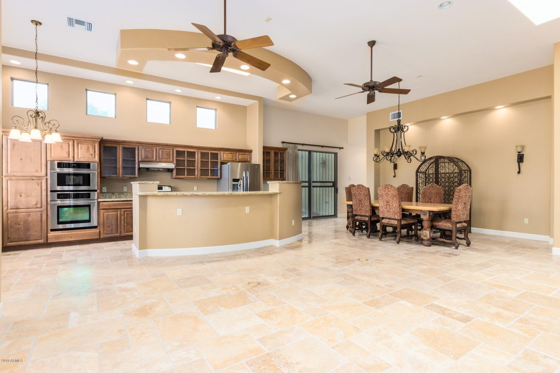 17412 West Ocotillo Road Waddell, AZ 85355 - Photo 5 of 32 Great Rm to Kitchen