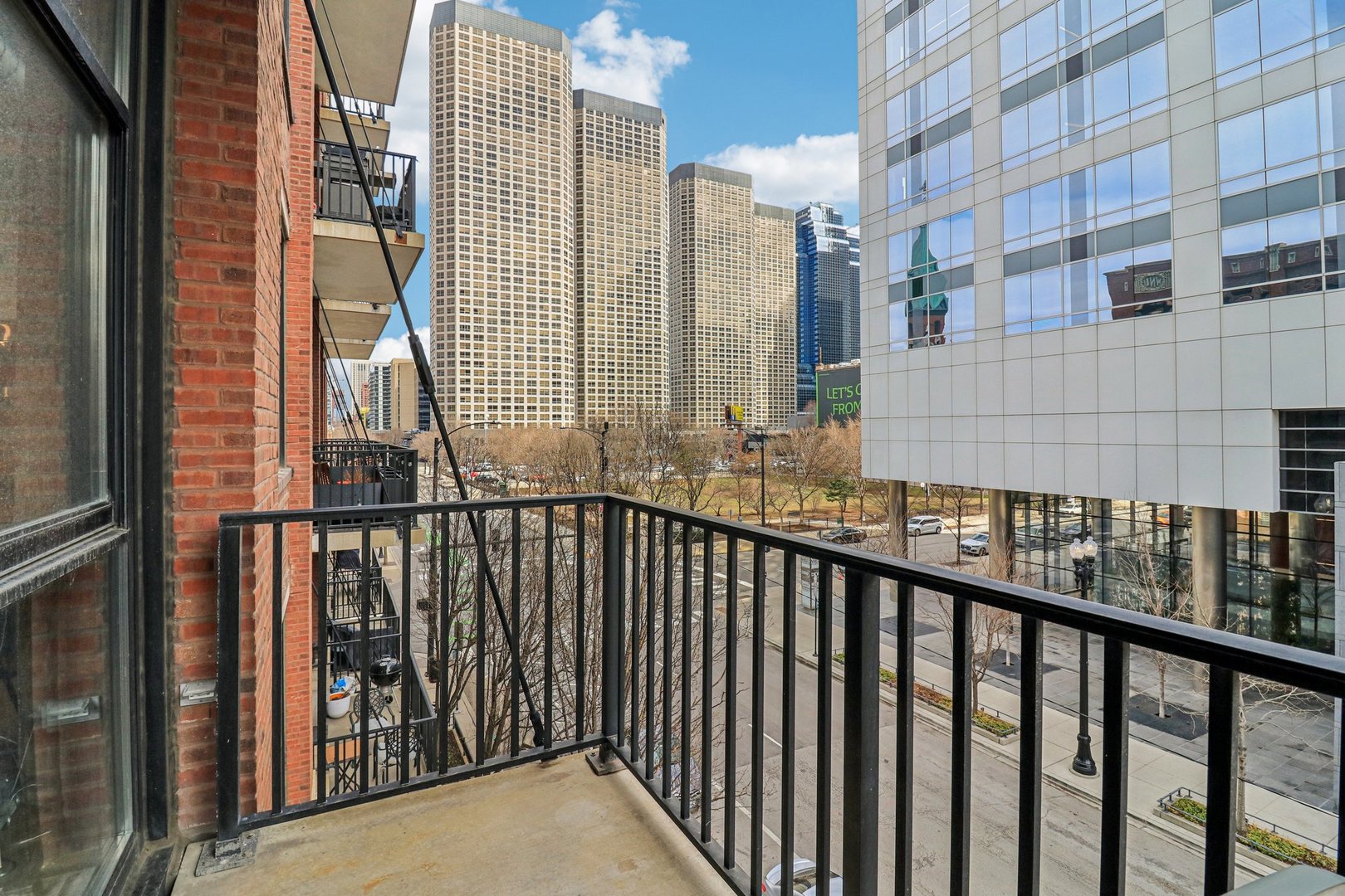 210 South Desplaines Street, Unit 304 Chicago, IL 60661 - Photo 3 of 19 a view of balcony with furniture