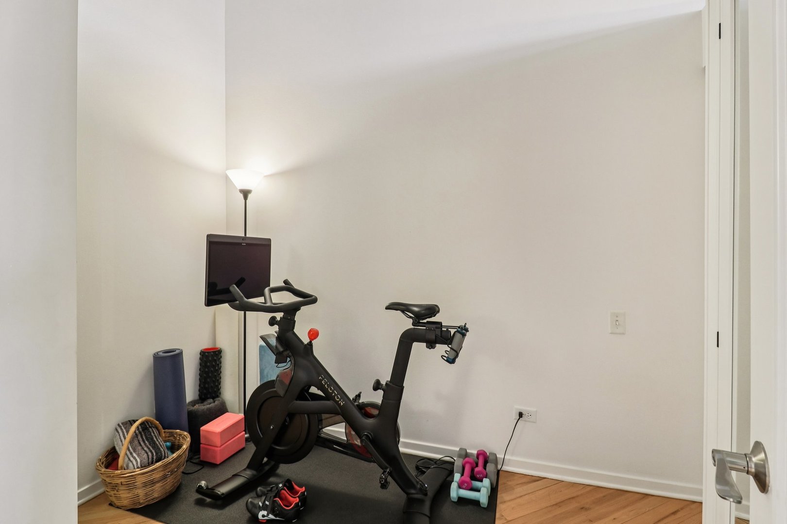 210 South Desplaines Street, Unit 304 Chicago, IL 60661 - Photo 9 of 19 a view of a room with gym equipment