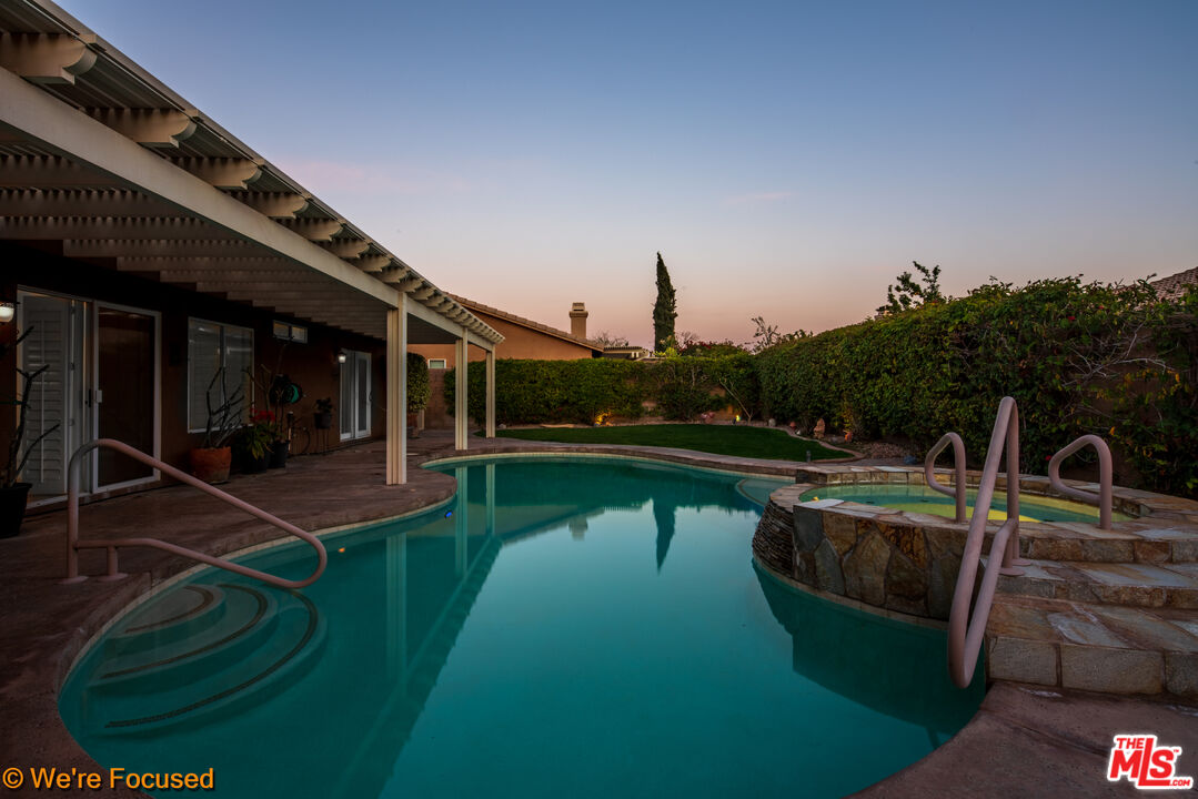 81129 La Reina Circle Indio, CA 92201 - Photo 41 of 46 a view of a swimming pool with a patio