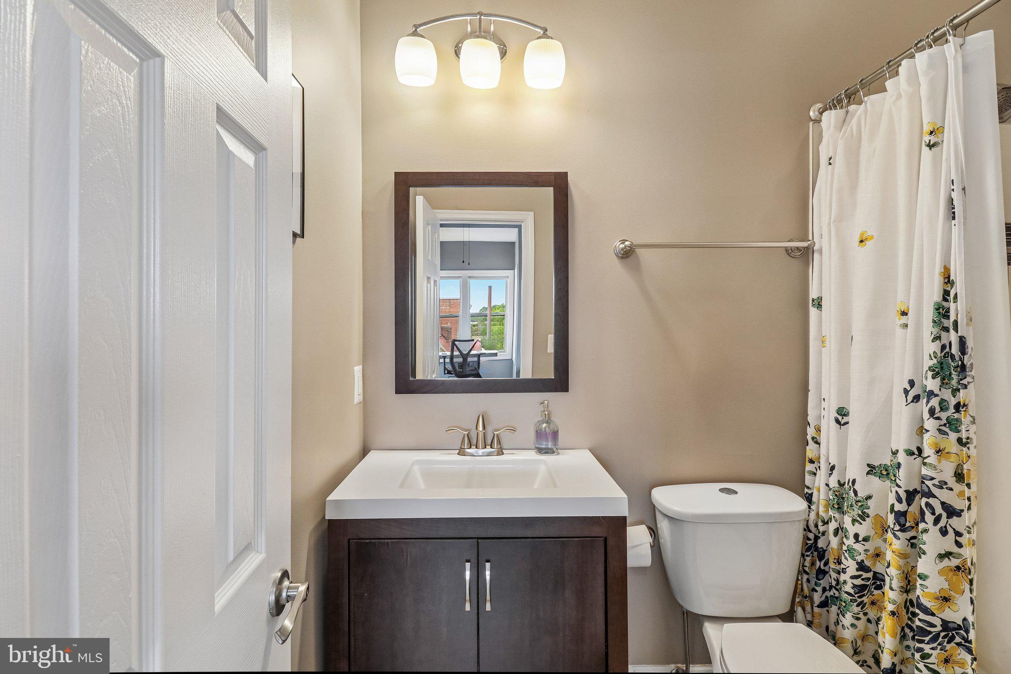 233 S Street Northeast, Unit 5 Washington, DC 20002 - Photo 20 of 41 Charming bathroom with modern touches.