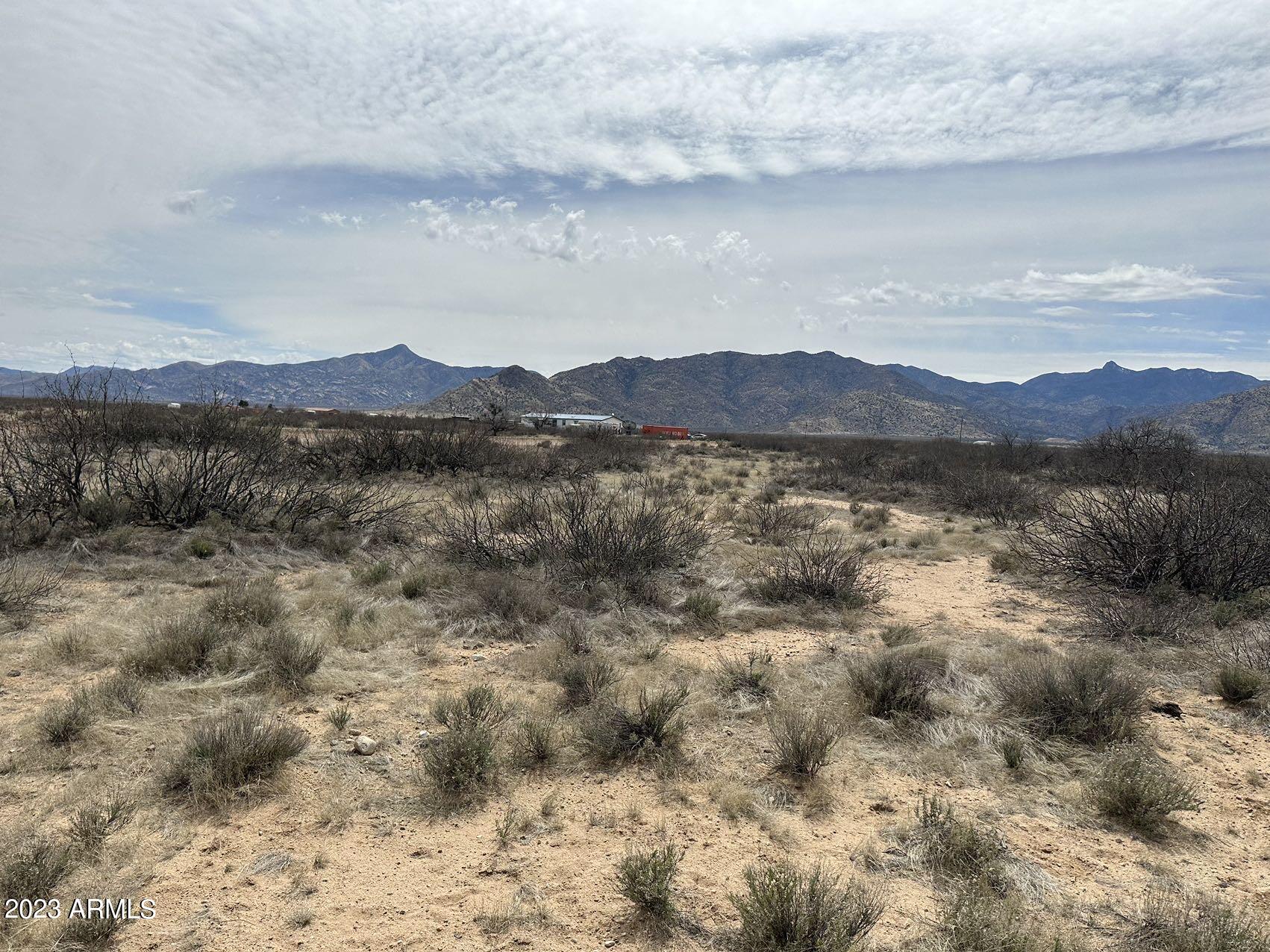 Aaa South Buckeye Apache Road, Unit 9 Bowie, AZ 85605 - Photo 2 of 3 a view of lake with mountain