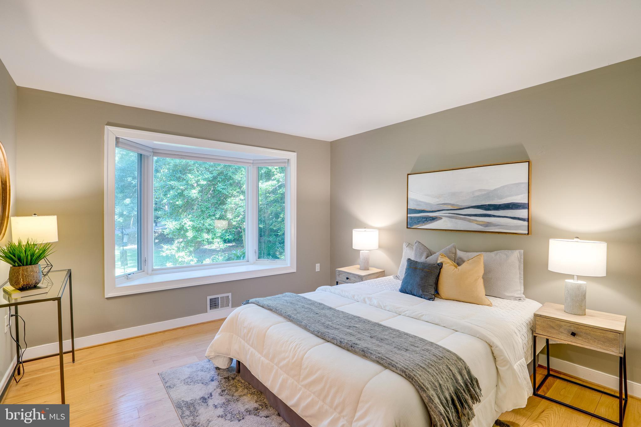 2603 Penny Royal Lane Reston, VA 20191 - Photo 14 of 72 a bedroom with a large bed and a large window