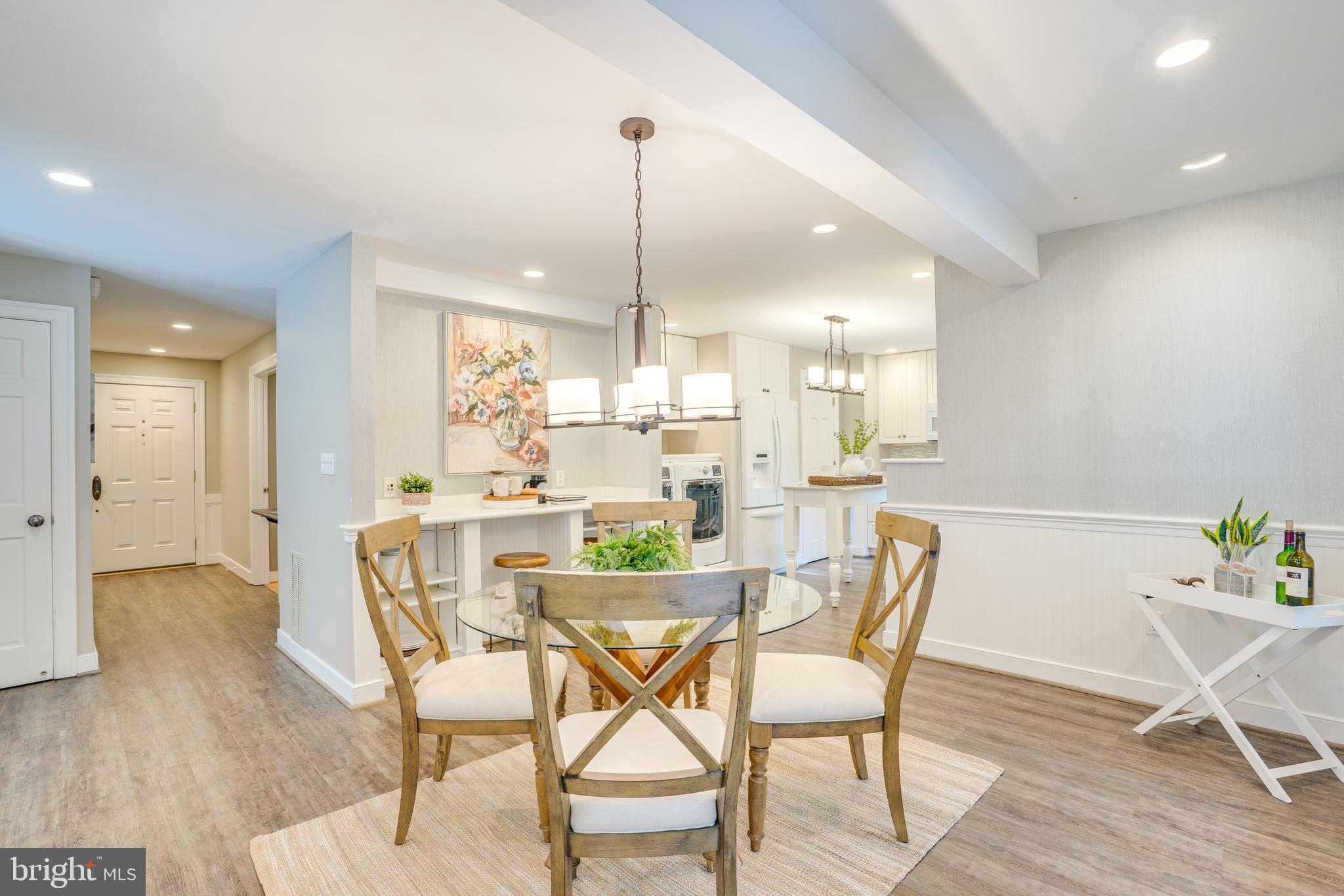 2603 Penny Royal Lane Reston, VA 20191 - Photo 32 of 72 a view of a dining room with furniture and wooden floor