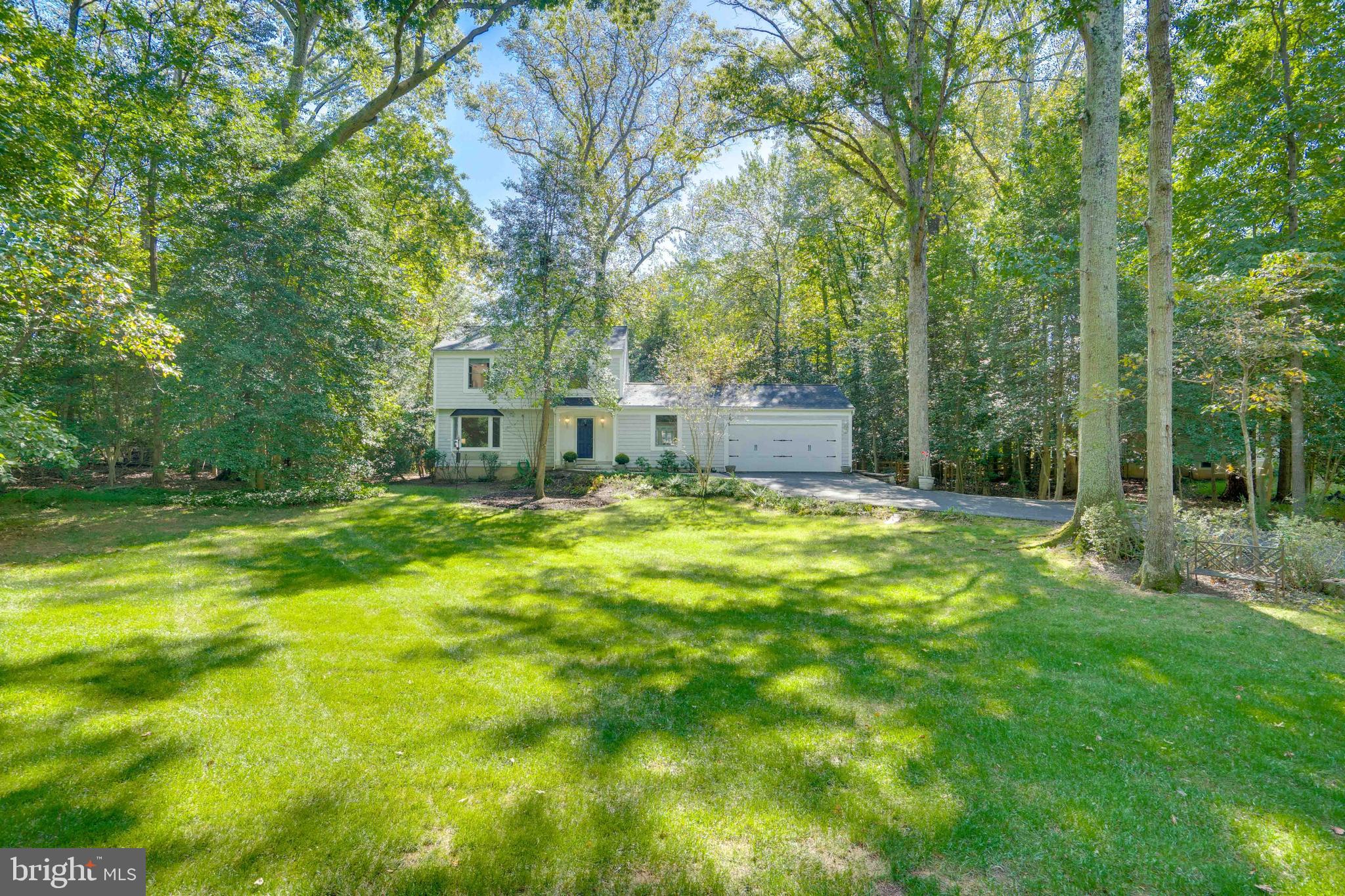 2603 Penny Royal Lane Reston, VA 20191 - Photo 4 of 72 a view of a house with a big yard potted plants and large tree