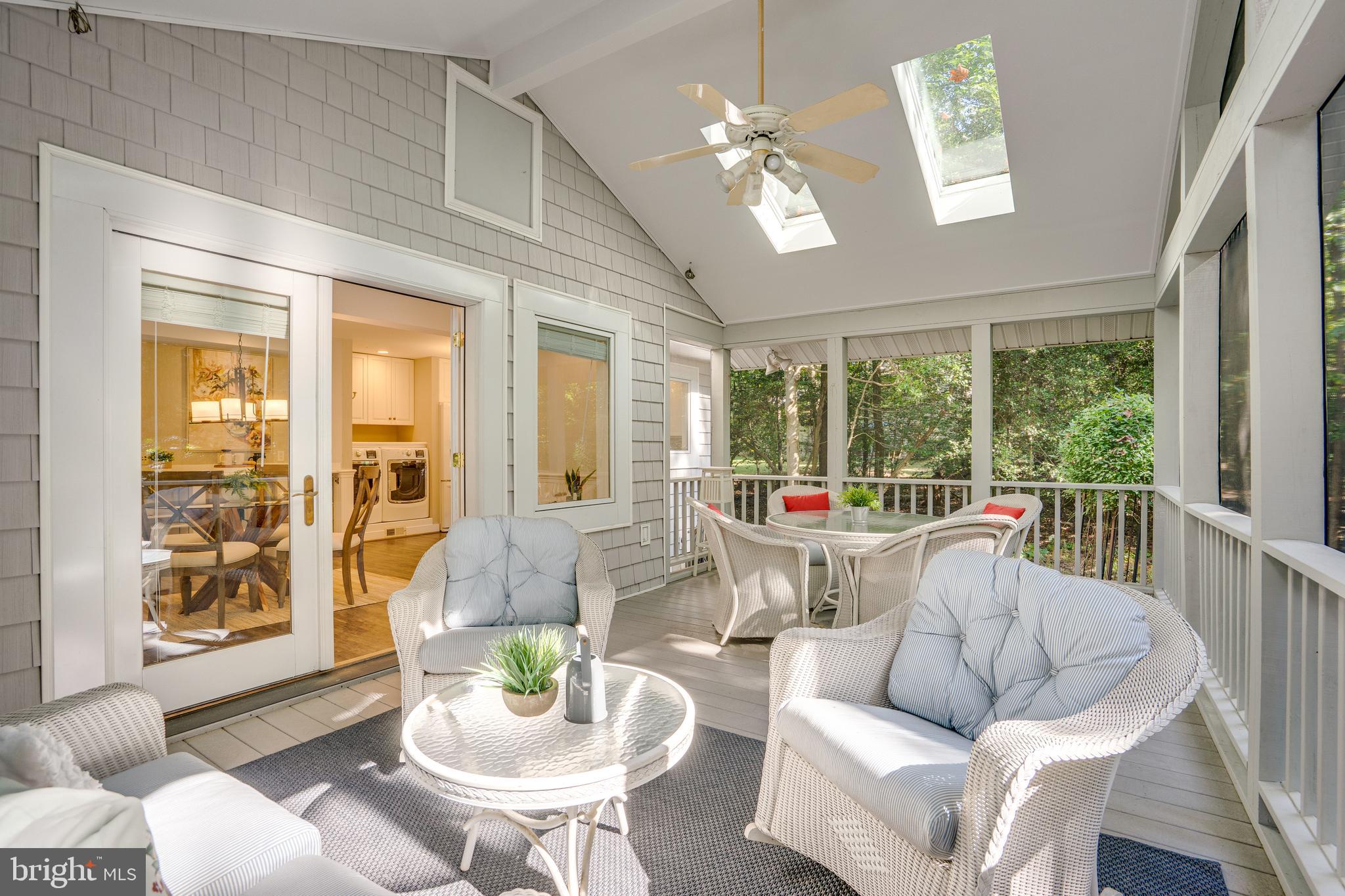 2603 Penny Royal Lane Reston, VA 20191 - Photo 41 of 72 a living room with furniture and a large window