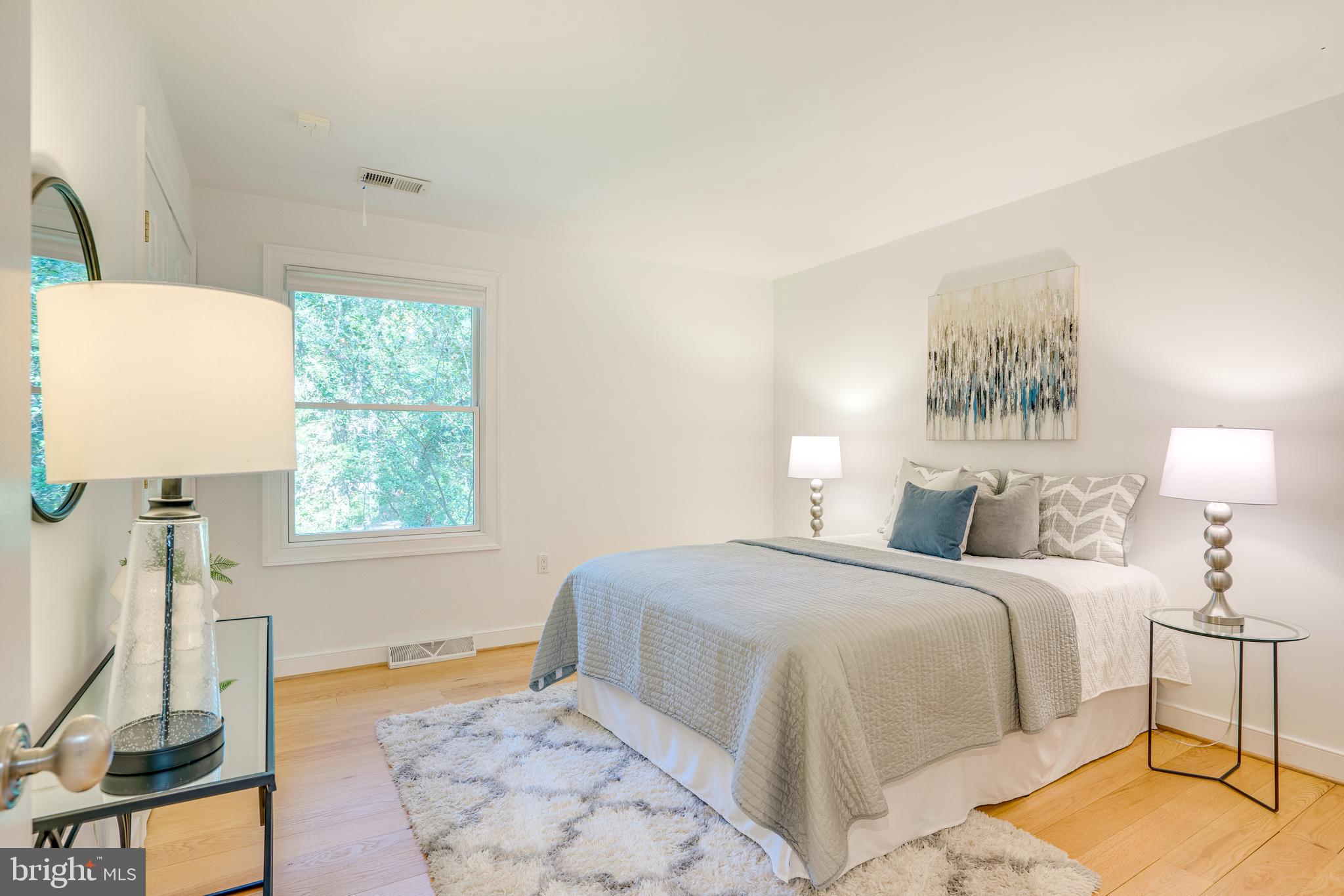 2603 Penny Royal Lane Reston, VA 20191 - Photo 55 of 72 a bedroom with a bed and a window