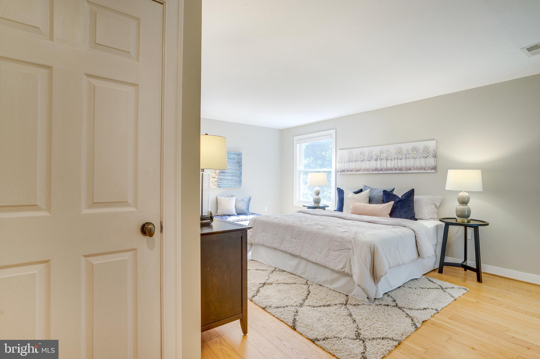 2603 Penny Royal Lane Reston, VA 20191 - Photo 59 of 72 a bedroom with a bed and a window