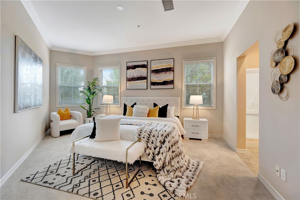 3405 South Main Street, Unit D Santa Ana, CA 92707 - Photo 13 of 30 a bedroom with furniture and a large window