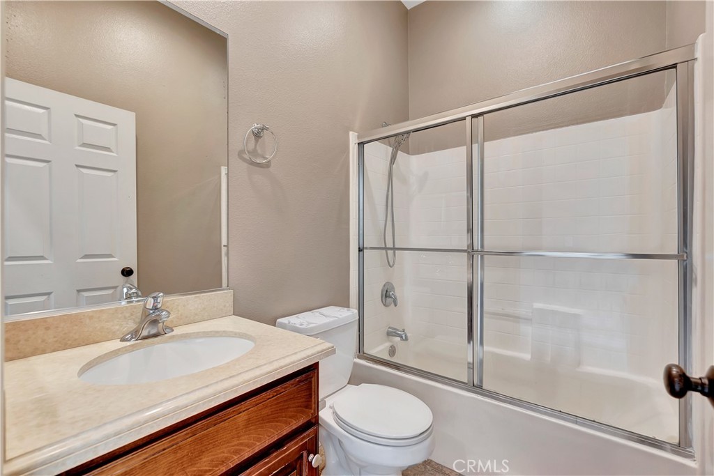 3405 South Main Street, Unit D Santa Ana, CA 92707 - Photo 20 of 30 a bathroom with a sink toilet and shower