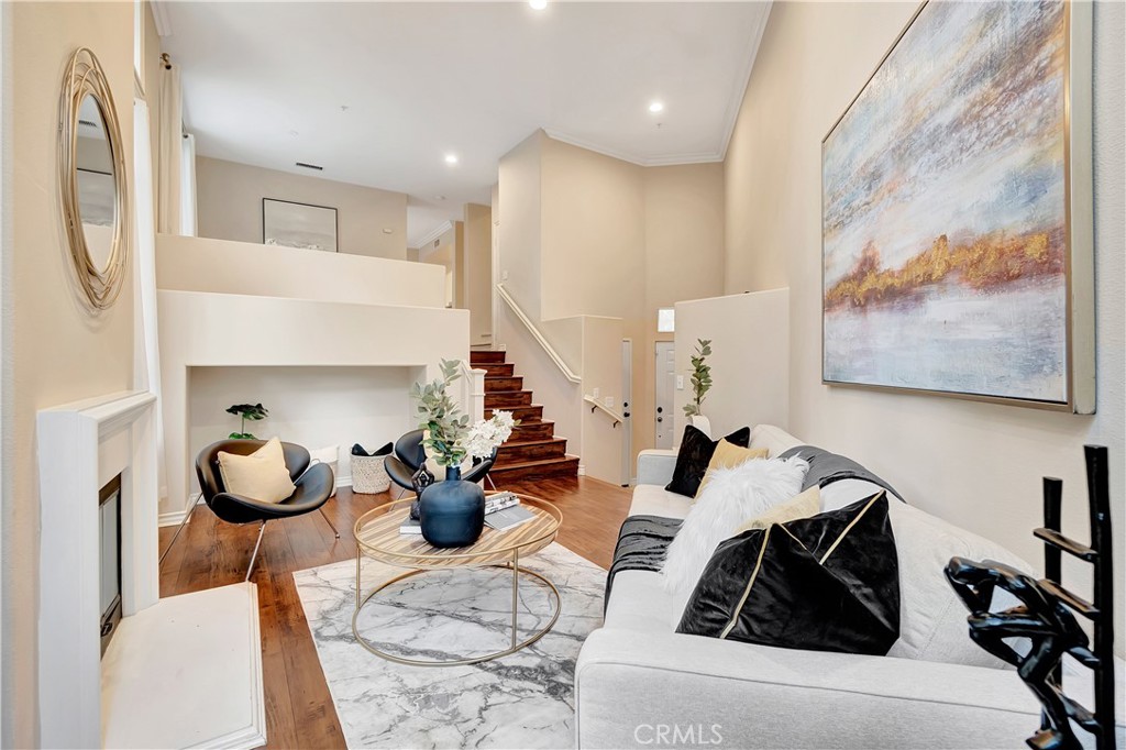3405 South Main Street, Unit D Santa Ana, CA 92707 - Photo 3 of 30 a living room with furniture and a painting