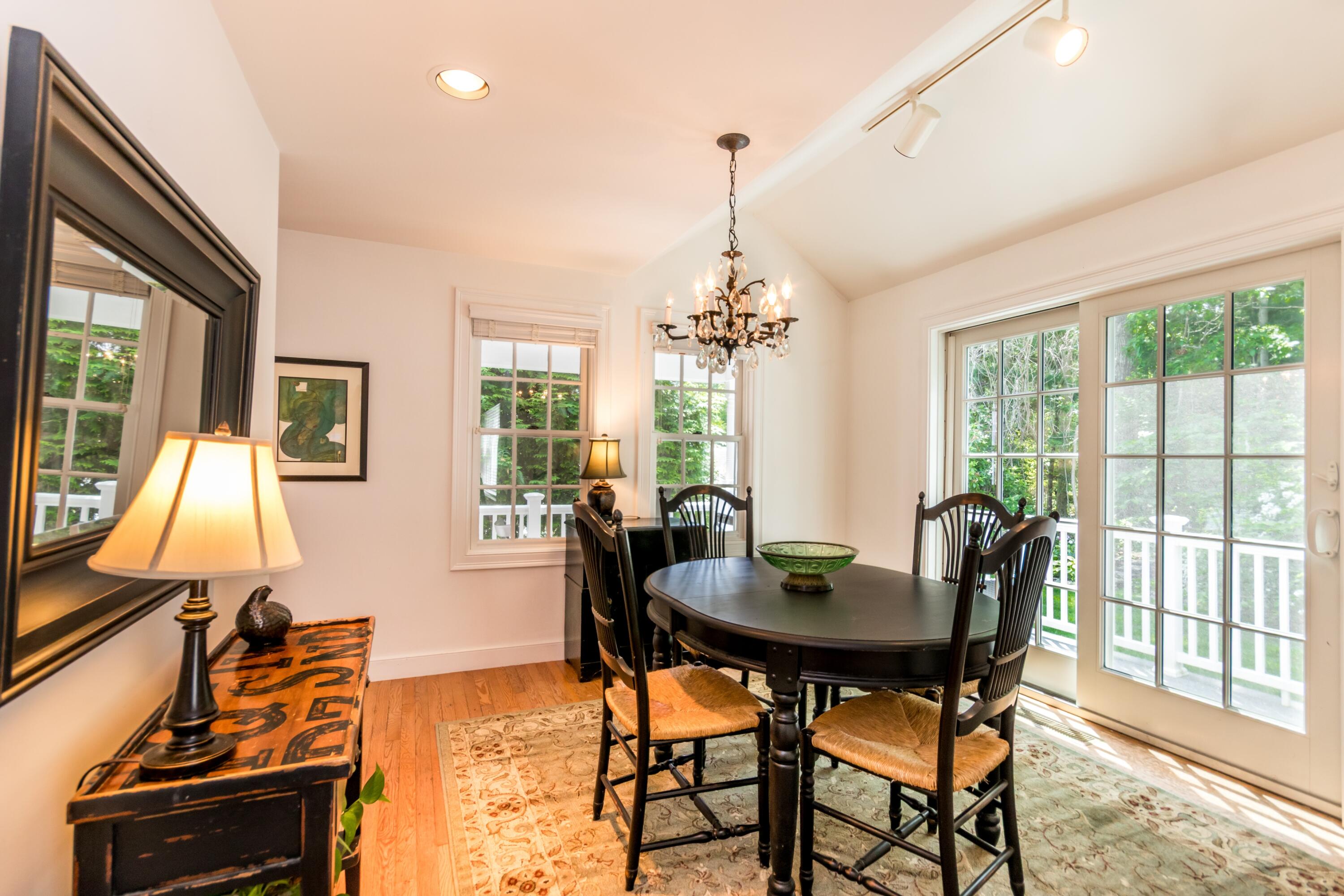 15 Hampton Court, Unit 15 Mashpee, MA 02649 - Photo 13 of 40 a view of a dining room with furniture window and outside view
