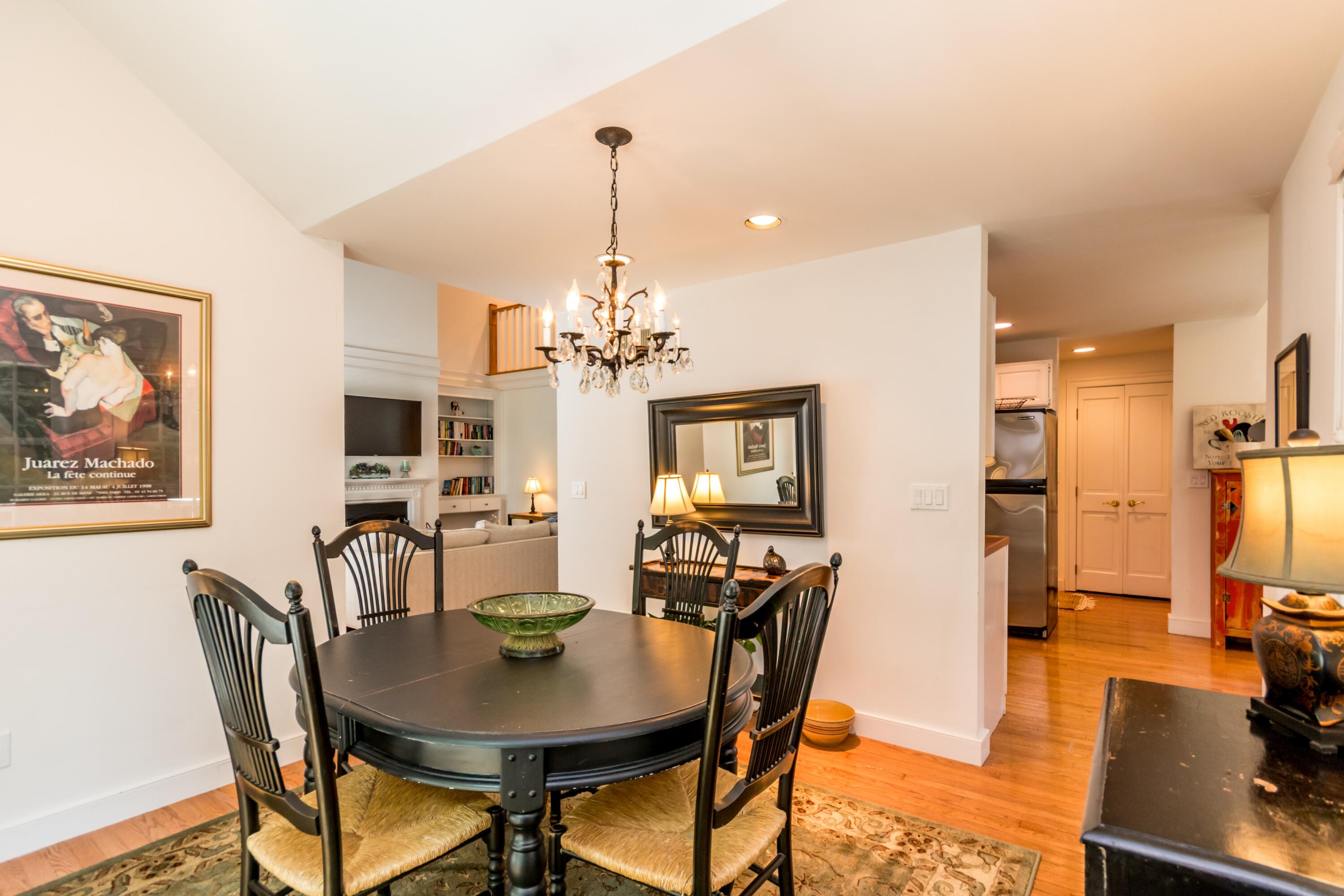 15 Hampton Court, Unit 15 Mashpee, MA 02649 - Photo 40 of 40 a view of a dining room with furniture and wooden floor