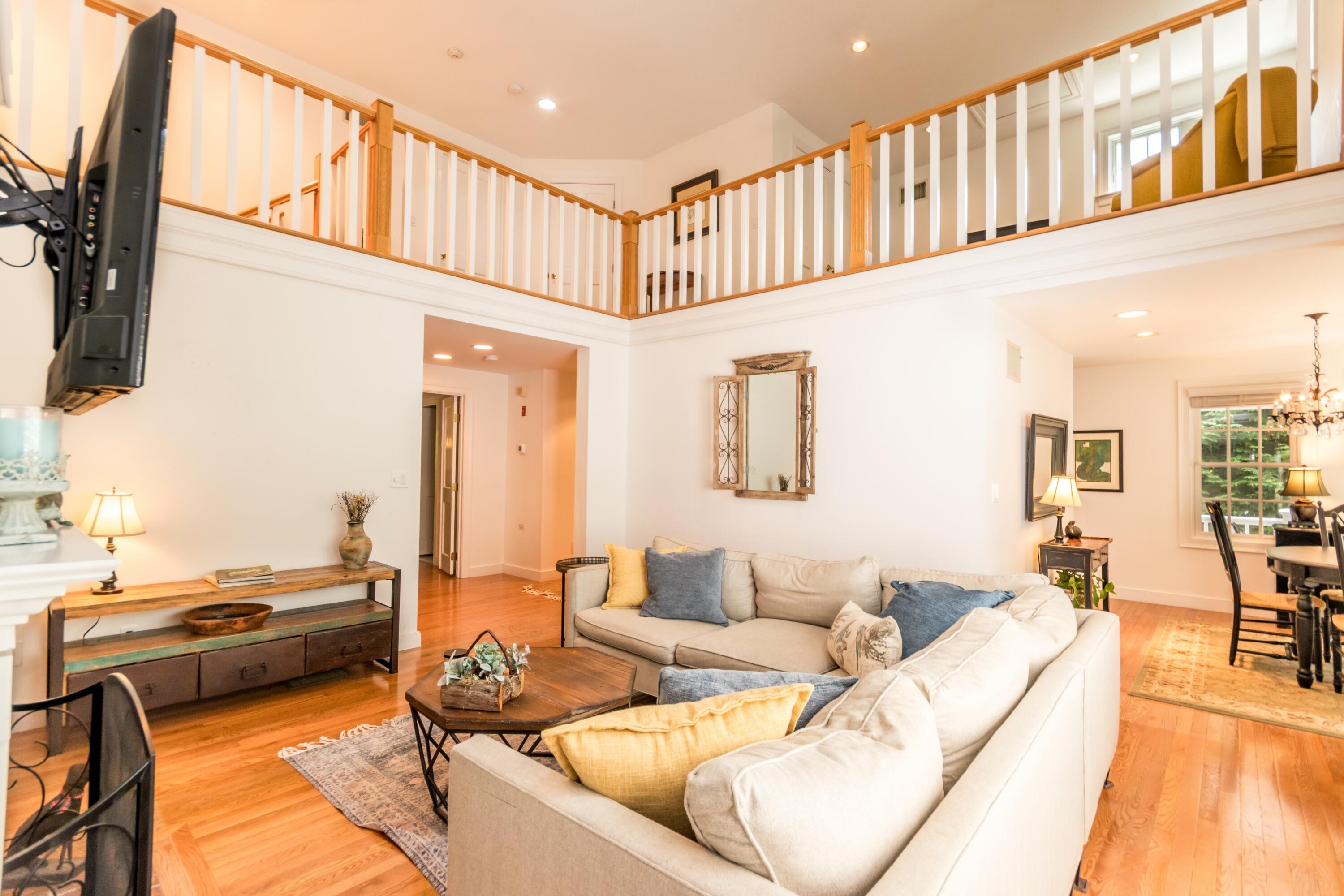 15 Hampton Court, Unit 15 Mashpee, MA 02649 - Photo 16 of 40 a living room with furniture and a large window