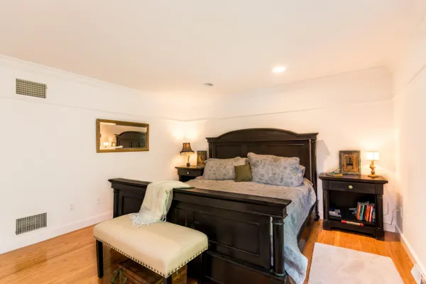 a view of living room with furniture and a window