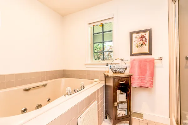 a bathroom with a sink double vanity and a mirror
